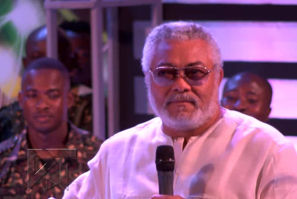 Jerry Rawlings on the Mic (Giving Akosua Adjapong an electrifying peck)